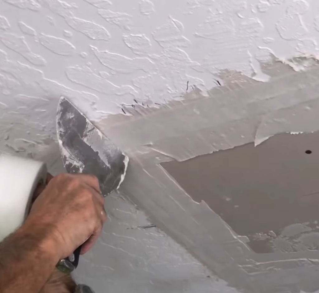 Applying fiber tape to drywall