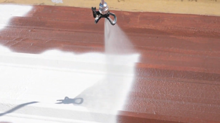 painting a metal roof with white spray paint
