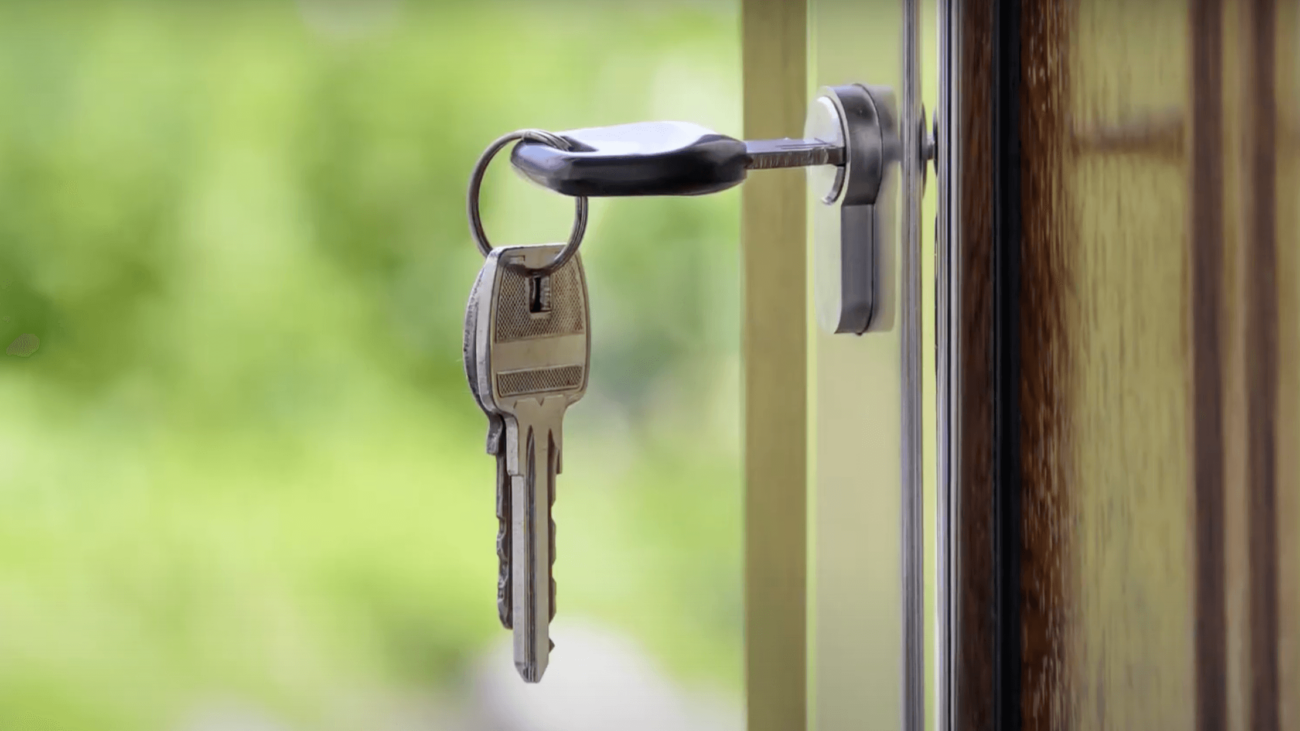 key unlocking a door