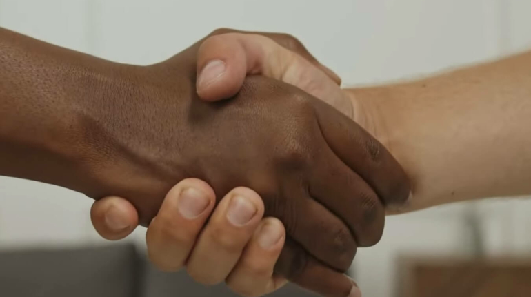 two people shaking hands