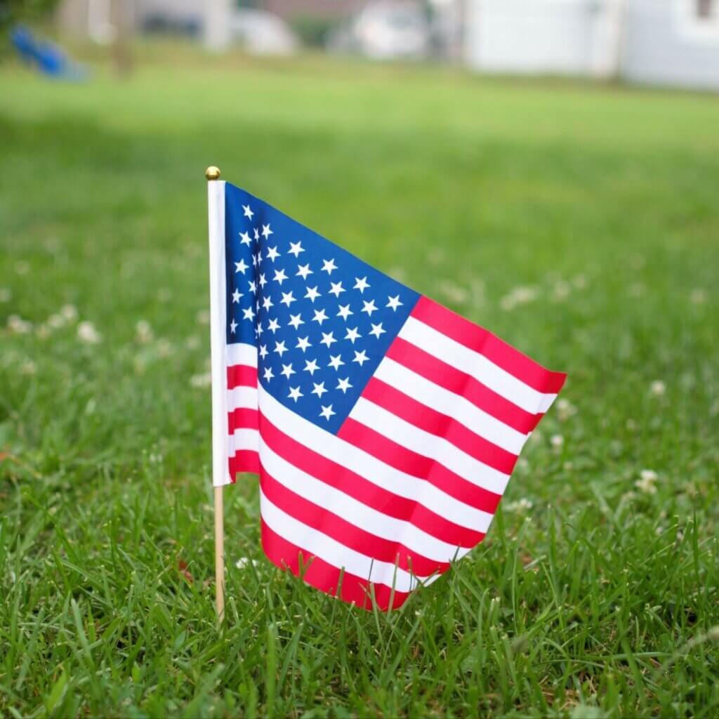 Small American flag in the ground